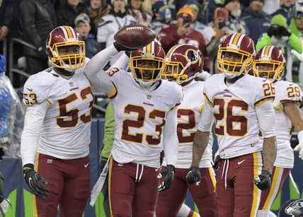 Redskins celebrate an interception against the Seahawks in NFL Week 9