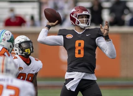 Jan 30, 2021; Mobile, AL, USA; National quarterback Feleipe Franks of Arkansas (8) throws in the first half of the 2021 Senior Bowl at Hancock Whitney Stadium. Mandatory Credit: Vasha Hunt-USA TODAY Sports