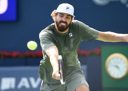 Aug 14, 2021; Toronto, Ontario, Canada;  Reilly Opelka of the United States plays a shot against Stefanos Tsiitsipas of Greece in the semi finals of the National Bank Open at Aviva Centre. Mandatory Credit: Dan Hamilton-USA TODAY Sports