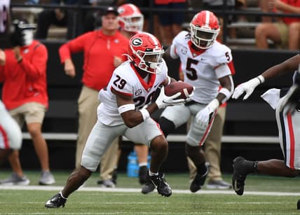 Sep 25, 2021; Nashville, Tennessee, USA; Georgia Bulldogs defensive back Christopher Smith (29) runs after an interception during the first half against the Vanderbilt Commodores at Vanderbilt Stadium. Mandatory Credit: Christopher Hanewinckel-USA TODAY Sports