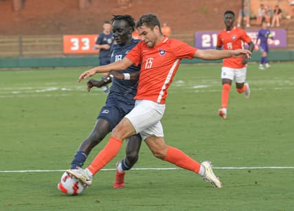 Georgia Southern midfielder Jeremiah Luoma, left, and Clemson defender Charlie Asensio reach for a ball during the first half at Historic Riggs Field at Clemson University on Tuesday, September 14, 2021. Clemson won 5-0.

Clemson Vs Ga Sou Mens Soccer