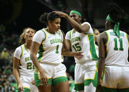 Oregon's Nyara Sabally, center, is congradulated by teammates during the game against Arizona in Eugene Saturday Jan. 15, 2022.

Fb Eug 011522 Uo Women Bkb 21