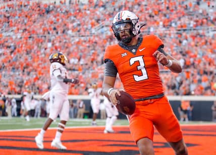 Oklahoma State's Spencer Sanders (3) scores a touchdown in the second quarter during the college football game between the Oklahoma State Cowboys and Central Michigan Chippewa at Boone Pickens Stadium in Stillwater, Oka., Thursday, Sept., 1, 2022. OSU won 58-44.

Osu Vs Central Michigan