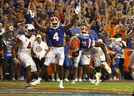 Sep 3, 2022; Gainesville, Florida, USA; Florida Gators quarterback Anthony Richardson (15) scores a touchdown against the Utah Utes during the second half at Steve Spurrier-Florida Field. Mandatory Credit: Kim Klement-USA TODAY Sports