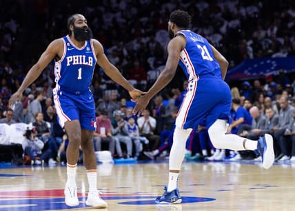 Oct 20, 2022; Philadelphia, Pennsylvania, USA; Philadelphia 76ers guard James Harden (1) congratulates center Joel Embiid (21) after scoring against the Milwaukee Bucks during the first quarter at Wells Fargo Center. Mandatory Credit: Bill Streicher-USA TODAY Sports
