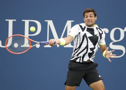 Sep 1, 2021; Flushing, NY, USA; Bernabe Zapata Miralles of Spain hits a shot against Felix Auger-Aliassime of Canada in a second round match on day three of the 2021 U.S. Open tennis tournament at USTA Billie Jean King National Tennis Center. Mandatory Credit: Jerry Lai-USA TODAY Sports