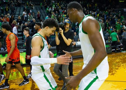 Oregon's Will Richardson, left, is congratulated by N'Faly Dante after leading the Ducks to a win over Oregon State at Matthew Knight Arena Saturday, Dec 31, 2022 in Eugene, Oregon, USA.

Ncaa Basketball Oregon Vs Osu Oregon State At Oregon