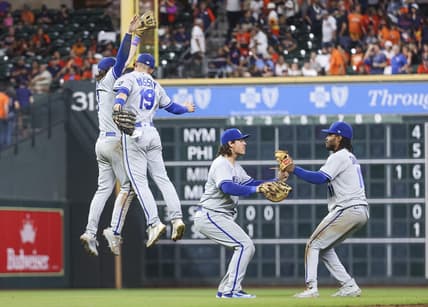 Sep 22, 2023; Houston, Texas, USA; Kansas City Royals first baseman Nick Pratto (32) and second baseman Michael Massey (19) leap to celebrate after the game against the Houston Astros at Minute Maid Park. Mandatory Credit: Troy Taormina-USA TODAY Sports
