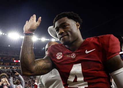 Nov 4, 2023; Tuscaloosa, Alabama, USA; Alabama Crimson Tide quarterback Jalen Milroe (4) waves to fans as he walks off the field during the second half at Bryant-Denny Stadium. Mandatory Credit: Butch Dill-USA TODAY Sports