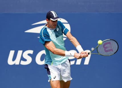 Aug 29, 2023; Flushing, NY, USA; Nicolas Jarry of Chile hits a shot against Luca Van Assche of France on day two of the 2023 U.S. Open tennis tournament at the USTA Billie Jean King National Tennis Center. Mandatory Credit: Jerry Lai-USA TODAY Sports