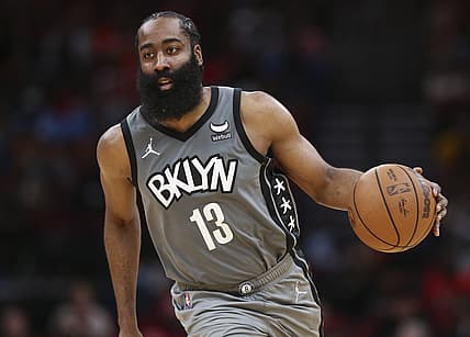 Dec 8, 2021; Houston, Texas, USA; Brooklyn Nets guard James Harden (13) dribbles the ball during the third quarter against the Houston Rockets at Toyota Center. Mandatory Credit: Troy Taormina-USA TODAY Sports