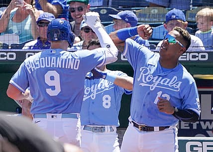 Aug 11, 2022; Kansas City, Missouri, USA; Kansas City Royals first baseman Vinnie Pasquantino (9) celebrates with designated hitter Salvador Perez (13) against the Chicago White Sox after his solo home run in the second inning at Kauffman Stadium. Mandatory Credit: Denny Medley-USA TODAY Sports