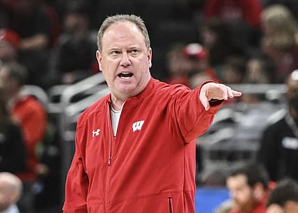 Mar 17, 2022; Milwaukee, WI, USA; Wisconsin Badgers head coach Greg Gard leads the team during practice before the first round of the 2022 NCAA Tournament at Fiserv Forum. Mandatory Credit: Benny Sieu-USA TODAY Sports