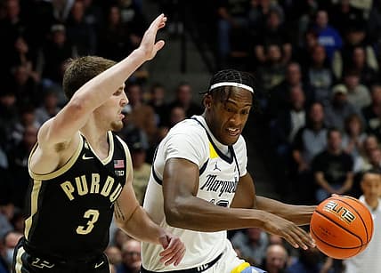 Marquette Golden Eagles forward Olivier-Maxence Prosper (12) drives to the basket during the NCAA men   s basketball game against the Purdue Boilermakers, Tuesday, Nov. 15, 2022, at Mackey Arena in West Lafayette, Ind.

Purduemarquettembb111522 Am34268