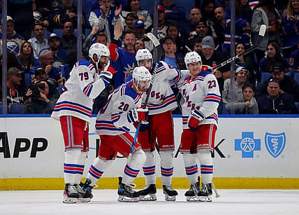 Oct 12, 2023; Buffalo, New York, USA;  New York Rangers left wing Chris Kreider (20) celebrates his goal with teammates during the third period against the Buffalo Sabres at KeyBank Center. Mandatory Credit: Timothy T. Ludwig-USA TODAY Sports