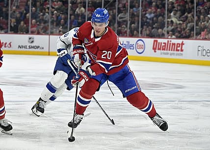 Nov 7, 2023; Montreal, Quebec, CAN; Montreal Canadiens forward Juraj Slafkovsky (20) plays the puck during the third period of the game against the Tampa Bay Lightning at the Bell Centre. Mandatory Credit: Eric Bolte-USA TODAY Sports