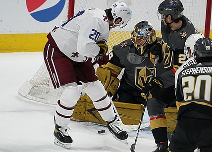 Mar 25, 2021; Denver, Colorado, USA; Colorado Avalanche left wing Brandon Saad (20) attempts a shot past Vegas Golden Knights goaltender Marc-Andre Fleury (29) in the first period at Ball Arena. Mandatory Credit: Ron Chenoy-USA TODAY Sports
