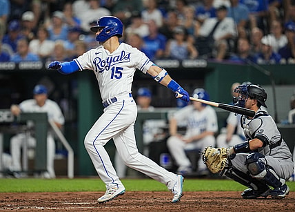 Aug 10, 2021; Kansas City, Missouri, USA; Kansas City Royals designated hitter Whit Merrifield (15) hits a double against the New York Yankees during the fifth inning at Kauffman Stadium. Mandatory Credit: Jay Biggerstaff-USA TODAY Sports