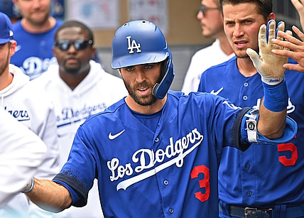 Aug 21, 2021; Los Angeles, California, USA;  Los Angeles Dodgers left fielder Chris Taylor (3) is greeted in the dugout after hitting a solo home run in the fourth inning of the game against the New York Mets at Dodger Stadium. Mandatory Credit: Jayne Kamin-Oncea-USA TODAY Sports