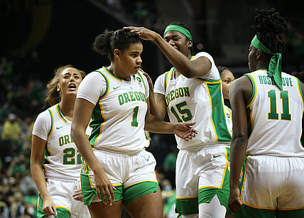 Oregon's Nyara Sabally, center, is congradulated by teammates during the game against Arizona in Eugene Saturday Jan. 15, 2022.

Fb Eug 011522 Uo Women Bkb 21