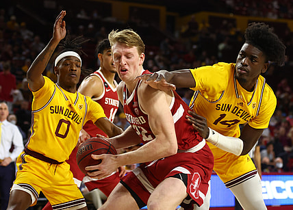 Mar 5, 2022; Tempe, Arizona, USA; Stanford Cardinal forward James Keefe (22) drives to the basket against Arizona State Sun Devils center Enoch Boakye (14) and guard DJ Horne (0) in the first half at Desert Financial Arena. Mandatory Credit: Mark J. Rebilas-USA TODAY Sports