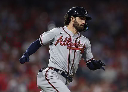 Oct 14, 2022; Philadelphia, Pennsylvania, USA; Atlanta Braves shortstop Dansby Swanson hits a double against the Philadelphia Phillies during the 6th inning in game three of the NLDS for the 2022 MLB Playoffs at Citizens Bank Park. Mandatory Credit: Bill Streicher-USA TODAY Sports