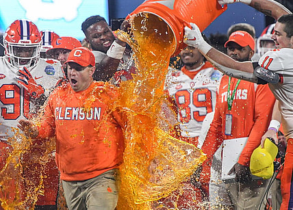 Clemson head coach Dabo Swinney gets dunked with sports drink by Clemson defensive lineman Bryan Bresee (11) during the fourth quarter of the ACC Championship football game at Bank of America Stadium in Charlotte, North Carolina Saturday, Dec 3, 2022.

Clemson Tigers Football Vs North Carolina Tar Heels Acc Championship Charlotte Nc