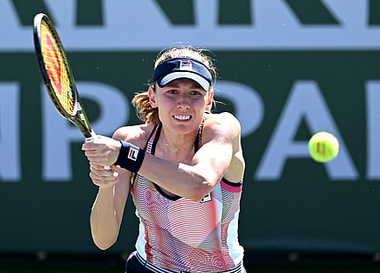 Mar 11, 2022; Indian Wells, CA, USA; Ekaterina Alexandrova (RUS) hits a shot in her 2nd round match against Simona Halep (ROU) at the BNP Paribas Open at the Indian Wells Tennis Garden. Mandatory Credit: Jayne Kamin-Oncea-USA TODAY Sports