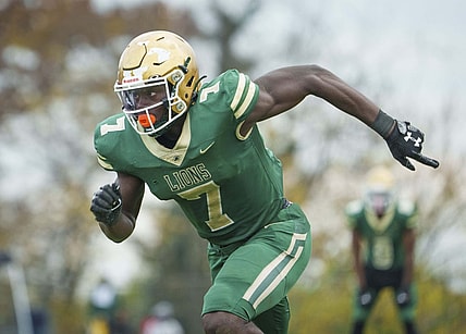 Nov 12, 2022; Washington, DC, USA;  Archbishop Carroll High School player Nyckoles Harbor (7) during the game as Archbishop Carroll High School defeated Bishop O'Connell High School 48-6 in WCAC Semi-Finals game at Bishop O'Connell High School.  Mandatory Credit: Jack Gruber-USA TODAY