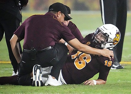 Arizona State Sun Devils quarterback Trenton Bourguet (16) grimaces after an ankle injury that forced him to leave the game against the Fresno State Bulldogs in the first half at Mountain America Stadium in Tempe on Sept. 16, 2023.