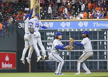 Sep 22, 2023; Houston, Texas, USA; Kansas City Royals first baseman Nick Pratto (32) and second baseman Michael Massey (19) leap to celebrate after the game against the Houston Astros at Minute Maid Park. Mandatory Credit: Troy Taormina-USA TODAY Sports