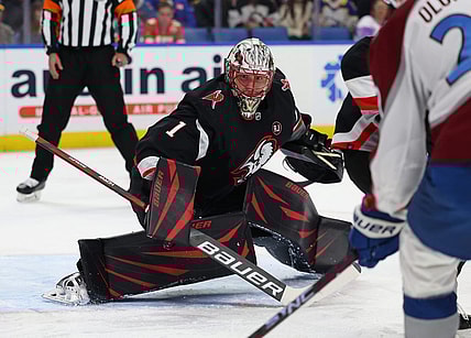 Oct 29, 2023; Buffalo, New York, USA;  Buffalo Sabres goaltender Ukko-Pekka Luukkonen (1) looks for the loose puck during the first period against the Colorado Avalanche at KeyBank Center. Mandatory Credit: Timothy T. Ludwig-USA TODAY Sports