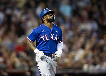Oct 30, 2023; Phoenix, AZ, USA; Texas Rangers right fielder Adolis Garcia (53) reacts after after suffering an injury in the eighth inning of game three of the 2023 World Series against the Arizona Diamondbacks at Chase Field. Mandatory Credit: Mark J. Rebilas-USA TODAY Sports