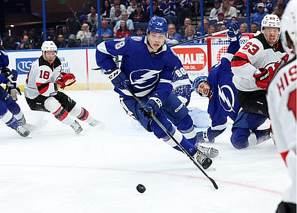 Jan 27, 2024; Tampa, Florida, USA; Tampa Bay Lightning defenseman Emil Martinsen Lilleberg (78) skates with the puck against the New Jersey Devils during the second period at Amalie Arena. Mandatory Credit: Kim Klement Neitzel-USA TODAY Sports