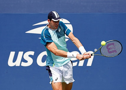 Aug 29, 2023; Flushing, NY, USA; Nicolas Jarry of Chile hits a shot against Luca Van Assche of France on day two of the 2023 U.S. Open tennis tournament at the USTA Billie Jean King National Tennis Center. Mandatory Credit: Jerry Lai-USA TODAY Sports