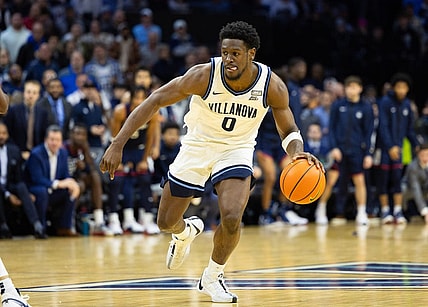 Jan 20, 2024; Philadelphia, Pennsylvania, USA; Villanova Wildcats guard TJ Bamba (0) dribbles the ball against the Connecticut Huskies during the second half at Wells Fargo Center. Mandatory Credit: Bill Streicher-USA TODAY Sports