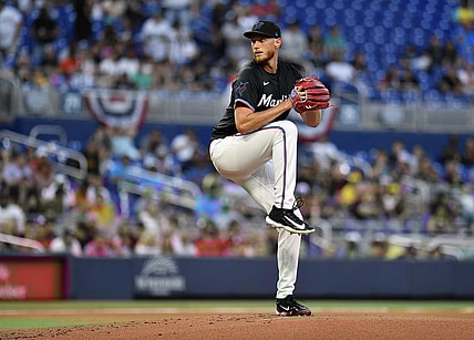 Mar 29, 2024; Miami, Florida, USA;  Miami Marlins starting pitcher A.J. Puk (35) winds up to throw a pitch during the first inning against the Pittsburgh Pirates at loanDepot Park. Mandatory Credit: Michael Laughlin-USA TODAY Sports
