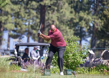 Charles Barkley golfing during tournament