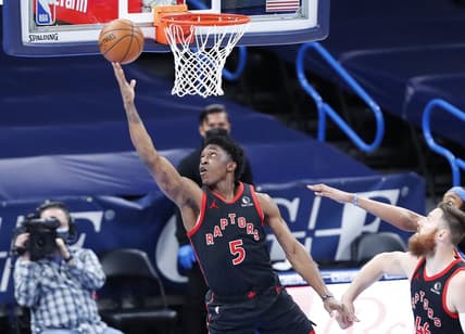Mar 31, 2021; Oklahoma City, Oklahoma, USA; Toronto Raptors forward Stanley Johnson (5) goes to the basket against the Oklahoma City Thunder during the first half at Chesapeake Energy Arena. Mandatory Credit: Alonzo Adams-USA TODAY Sports