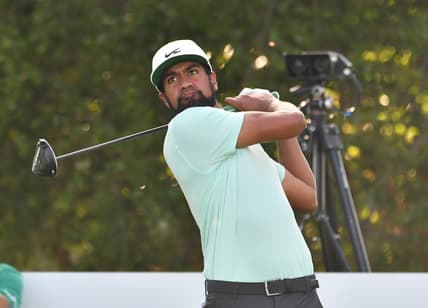 Aug 23, 2021; Jersey City, New Jersey, USA; Tony Finau hits his tee shot on the 17th hole during the final round of The Northern Trust golf tournament at the Liberty National Golf Club. Mandatory Credit: Mark Konezny-USA TODAY Sports