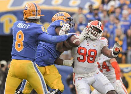 Pitt quarterback Kenny Pickett (8) throws near  Clemson defensive end Myles Murphy (98) trying to get by Pitt offensive lineman Marcus Minor (55)  during the second quarter at Heinz Field in Pittsburgh, Pennsylvania, Saturday, October 23, 2021.

Ncaa Football Clemson At Pitt