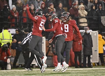 Nov 19, 2021; Pullman, Washington, USA; Washington State Cougars linebacker Kyle Thornton (52) celebrates against the Arizona Wildcats in the first half at Gesa Field at Martin Stadium. Mandatory Credit: James Snook-USA TODAY Sports