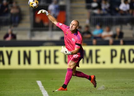 Sep 3, 2021; Philadelphia, Pennsylvania, USA; New England Revolution keeper Brad Knighton (18) passes the ball in the second half against the Philadelphia Union at Subaru Park. Mandatory Credit: Kyle Ross-USA TODAY Sports