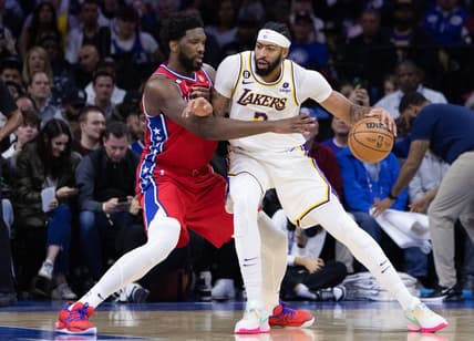 Dec 9, 2022; Philadelphia, Pennsylvania, USA; Los Angeles Lakers forward Anthony Davis (3) controls the ball against Philadelphia 76ers center Joel Embiid (21) during the first quarter at Wells Fargo Center. Mandatory Credit: Bill Streicher-USA TODAY Sports