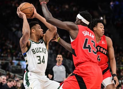 Mar 19, 2023; Milwaukee, Wisconsin, USA; Milwaukee Bucks forward Giannis Antetokounmpo (34) looks for a shot against Toronto Raptors forward Pascal Siakam (43) in the first quarter at Fiserv Forum. Mandatory Credit: Benny Sieu-USA TODAY Sports
