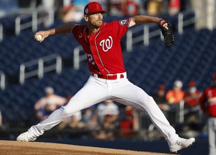 Mar 24, 2023; West Palm Beach, Florida, USA; Washington Nationals starting pitcher Chad Kuhl (52) pitches against the St. Louis Cardinals during the first inning at The Ballpark of the Palm Beaches. Mandatory Credit: Rhona Wise-USA TODAY Sports