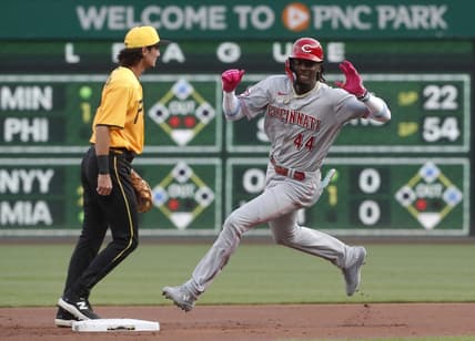 Aug 11, 2023; Pittsburgh, Pennsylvania, USA; Cincinnati Reds third baseman Elly De La Cruz (44) rounds second base on a two-RBI triple against the Pittsburgh Pirates during the first inning at PNC Park. Mandatory Credit: Charles LeClaire-USA TODAY Sports