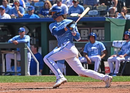 Aug 17, 2023; Kansas City, Missouri, USA;  Kansas City Royals shortstop Bobby Witt Jr. (7) doubles in the sixth inning against the Seattle Mariners at Kauffman Stadium. Mandatory Credit: Peter Aiken-USA TODAY Sports