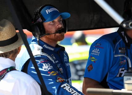 Aug 19, 2023; Watkins Glen, New York, USA; NASCAR Cup Series driver Chris Buescher looks at data during practice and qualifying for the Go Bowling at The Glen at Watkins Glen International. Mandatory Credit: Matthew O'Haren-USA TODAY Sports