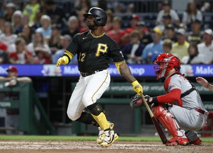 Aug 22, 2023; Pittsburgh, Pennsylvania, USA; Pittsburgh Pirates designated hitter Andrew McCutchen (22) hits a two run home run against the St. Louis Cardinals during the fifth inning at PNC Park. Mandatory Credit: Charles LeClaire-USA TODAY Sports